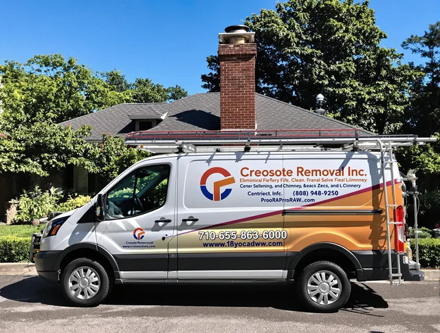 Lake Wylie Chimney Sweep technician removing creosote safely in Lake Wylie, SC