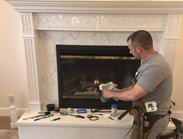 Lake Wylie Chimney Sweep performing fireplace maintenance in Lake Wylie, SC